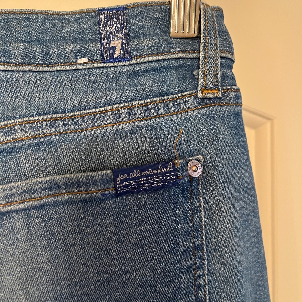 Beautiful Seven boot cut jeans. Very flattering.